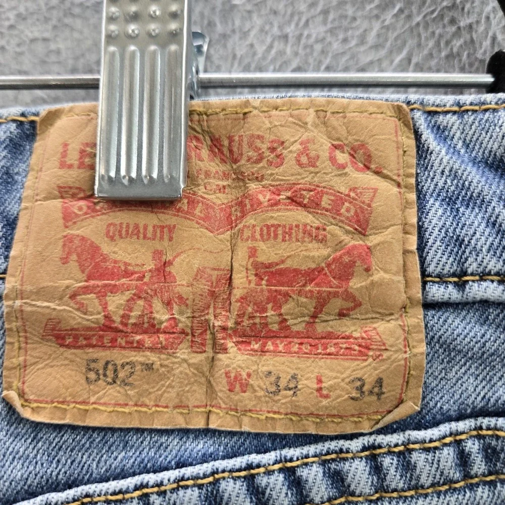 Levi's 502 Men Jeans 34X34 Light Blue Denim Relaxed Taper Fit 25
